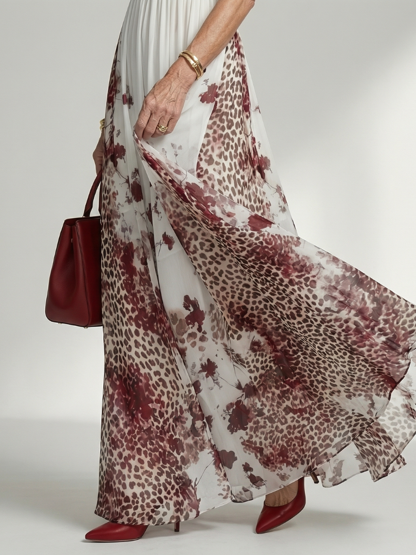 Orlune | Vestido largo plisado blanco con estampado floral